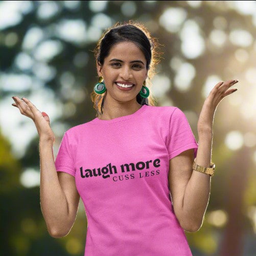 Country Clothing at Gravel Chic, Photo of a Woman Smiling and Shrugging, Wearing a Funny Country T-shirt