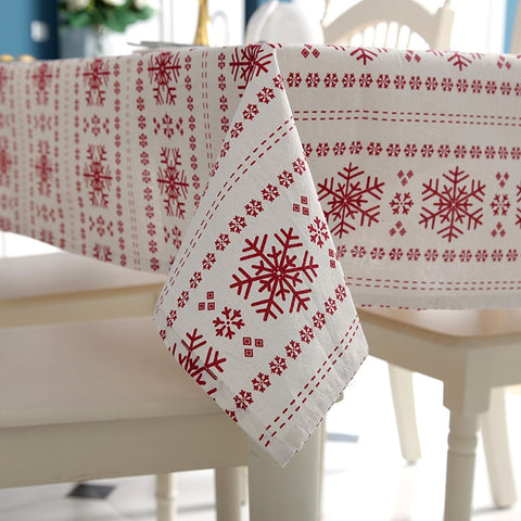 Red snowflakes on white tablecloth cottage core